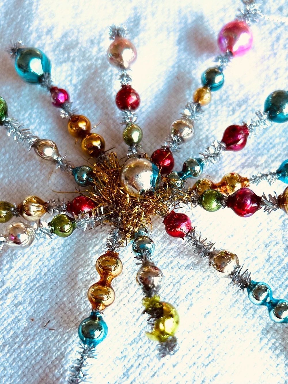Vintage repurposed holiday star burst Christmas Ornament